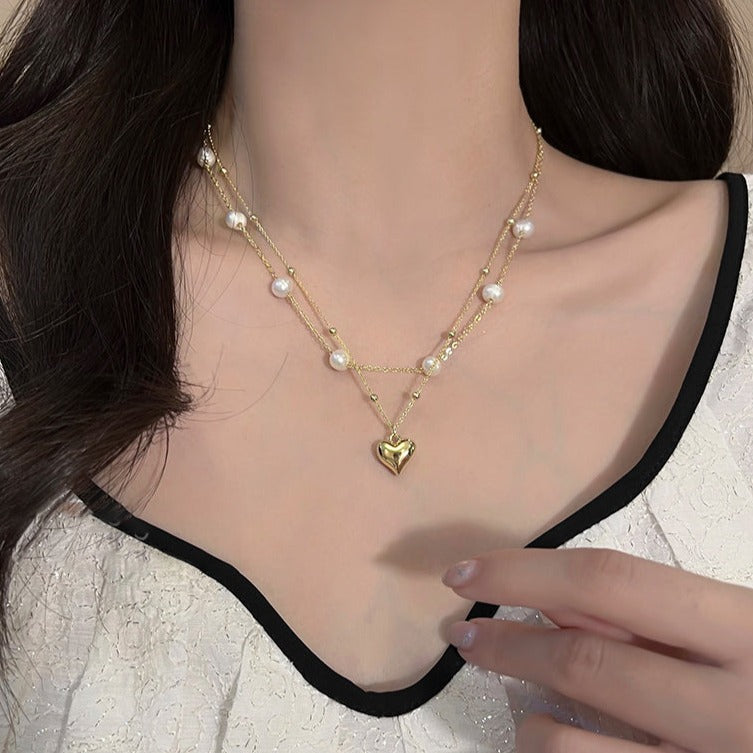Pearl love layered titanium steel necklace female spring ins niche design light luxury high-end collarbone chain necklace accessories